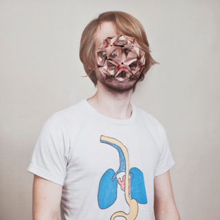 Illustration for article titled Portraits of people with origami faces are beautiful and mind-boggling